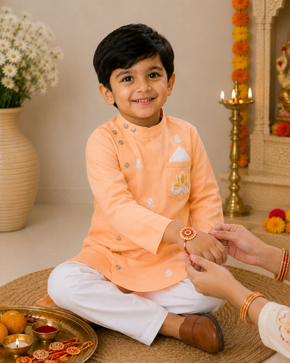 Boys  Peach Sherwani style kurta pant set for traditional Occasions like festivals like Diwali, Onam, Durga Puja/Dussehra, Janmashtami, Raksha Bandhan, Eid Ul Fitr, Ganesh Chaturthi, Navratri, Diwali etc.